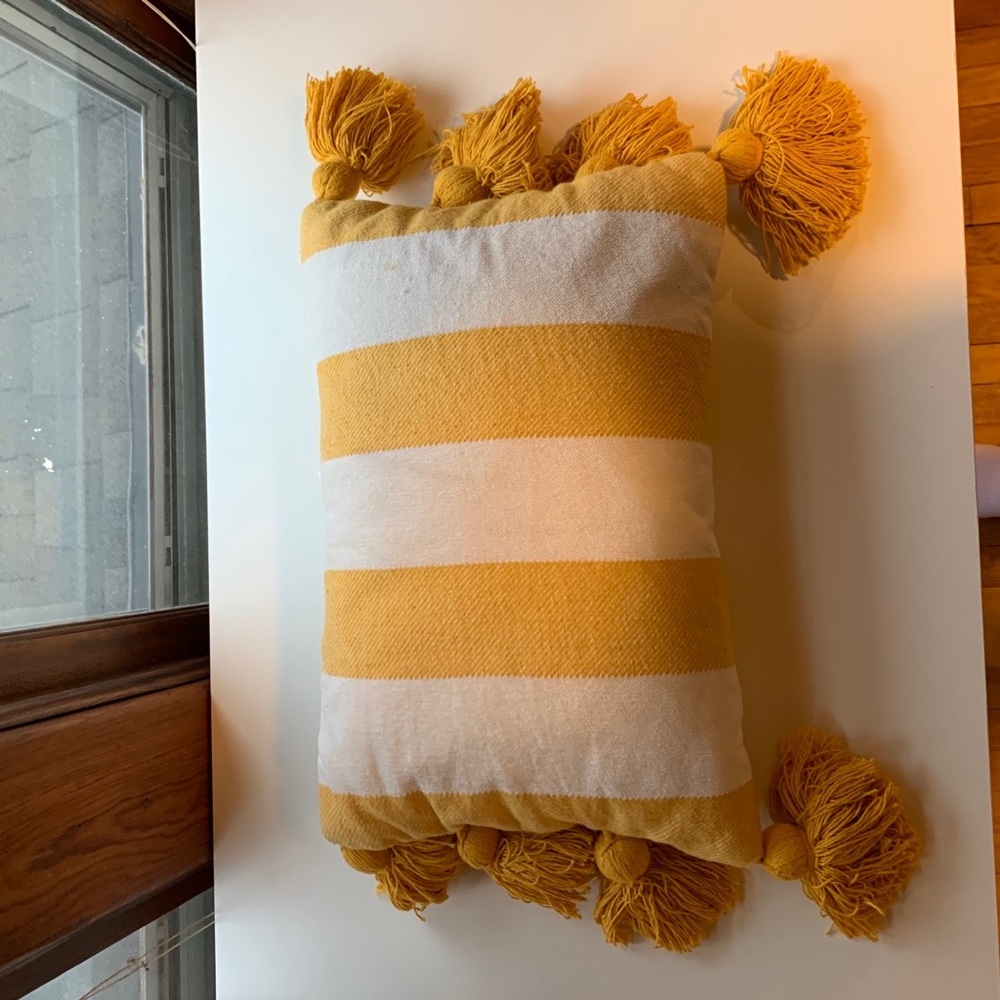 Yellow throw pillow